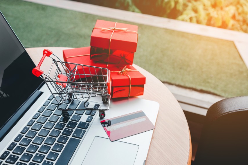 Presents-and-shopping-cart-on-laptop Presents-and-shopping-cart-on-laptop