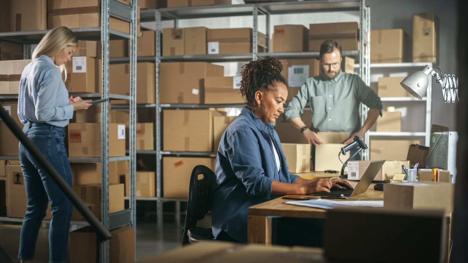 Establishing Shot of Multicultural Team of Warehouse Workers at