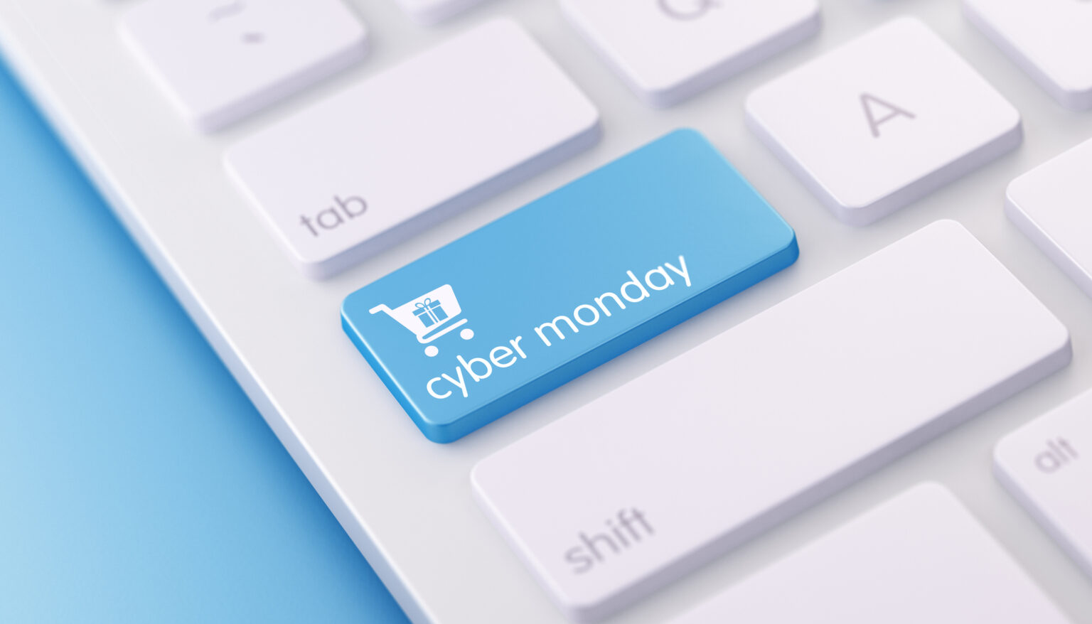 High quality 3d render of a modern keyboard with blue cyber monday button on a blue background and copy space. Blue cyber monday keyboard button has a text  and an icon on it. Cyber monday keyboard button is  in focus, Horizontal composition with copy space.