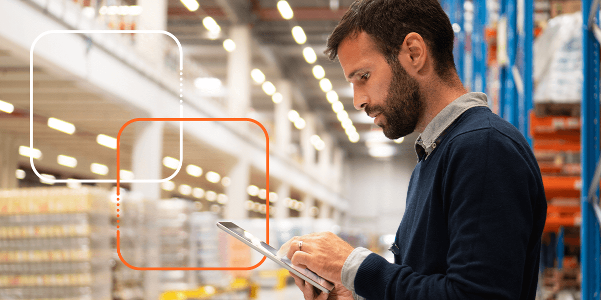 person using a tablet in a warehouse