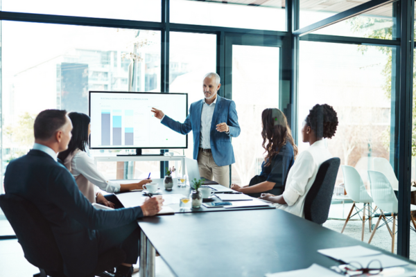 office workers reviewing a presentation