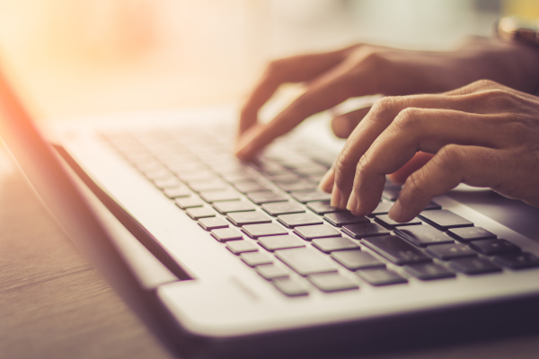 What is Release Management? programmer typing while working on release management